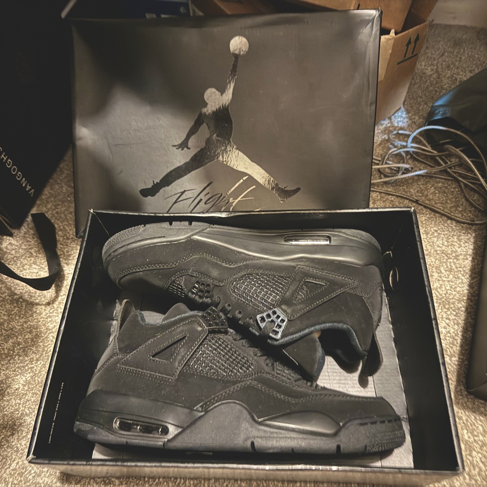 New in box all black Jordan retro fours come from a non-smoking home size 12